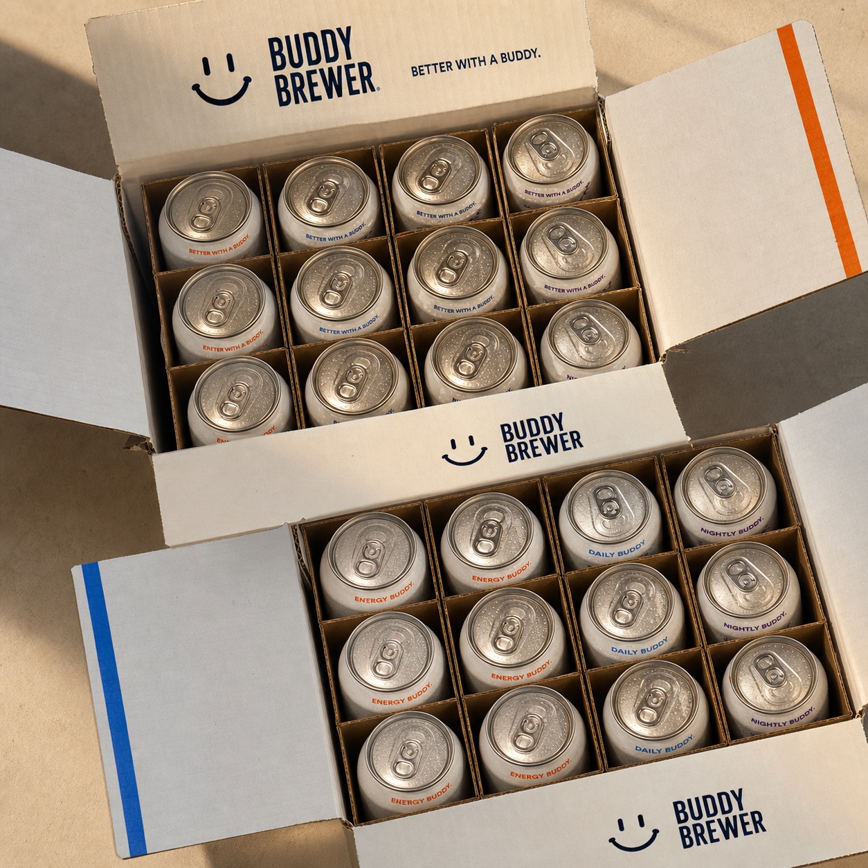 Two open Buddy Brewer shipping cases viewed from above with the three Buddy cans in dividers